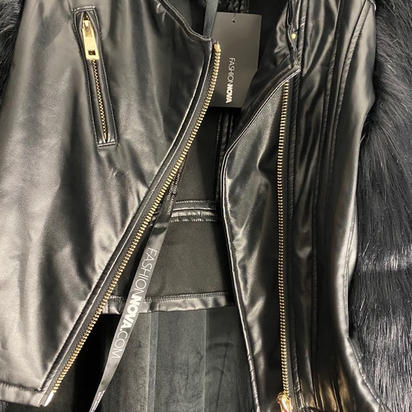 Faux leather coat with faux fur sleeves. - Picture 2 of 6